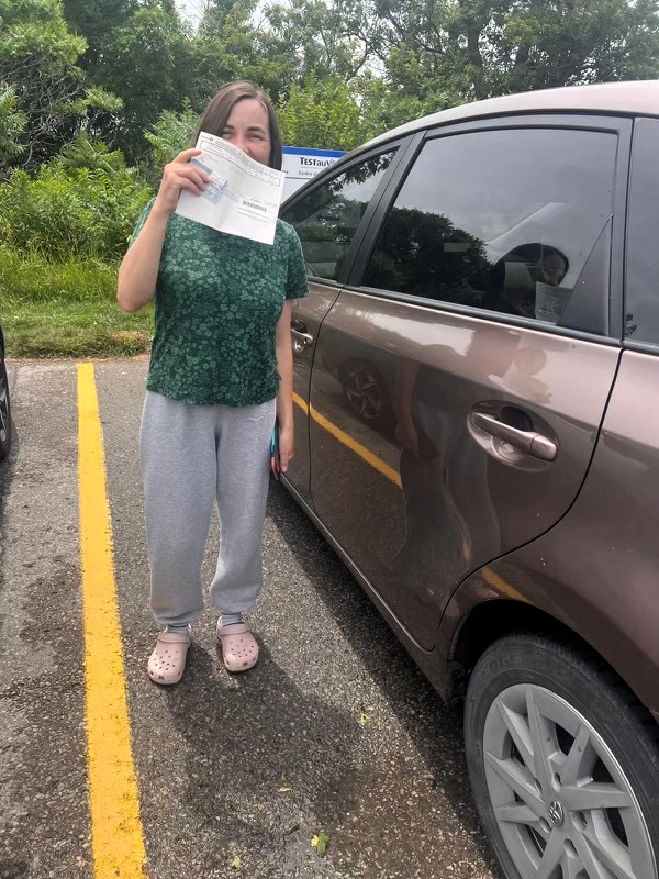 BSafe Driving School student with her driving test certificate